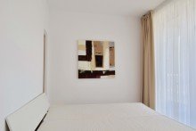 Schlafzimmer mit gro�em Bett Exklusiver Wohnkomfort- m�blierte Terrassenwohnung in Klinik- & Unin�he