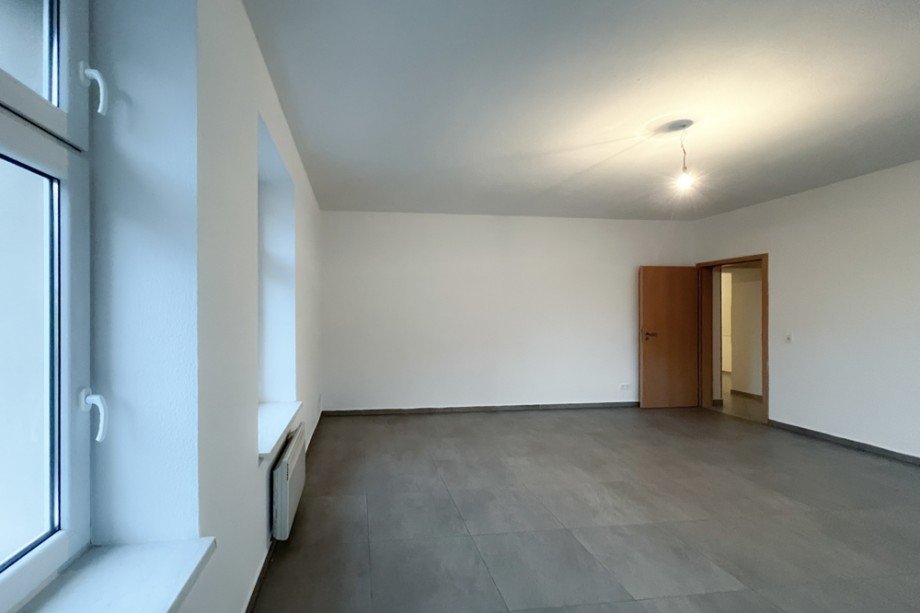 Wohnzimmer mit Fliesenboden Erdgeschosswohnung Udestedt