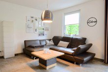 Wohnzimmer mit Ambiente Ihr neues Zuhause- Modernes Einfamilienhaus im Erfurter Umland