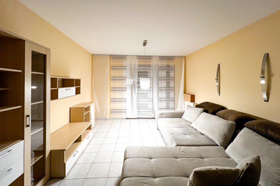 Wohnzimmer mit Balkonzugang Erdgeschosswohnung Nesse- Apfelst�dt / Kornhochheim