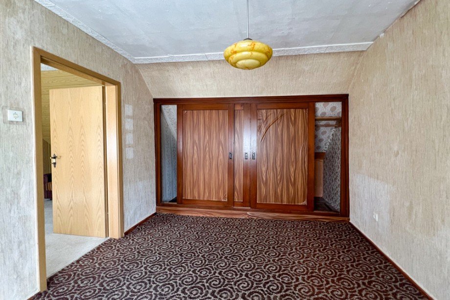 Hintere Schlafzimmer mit Einbauschrank Einfamilienhaus Am Ettersberg / Berlstedt