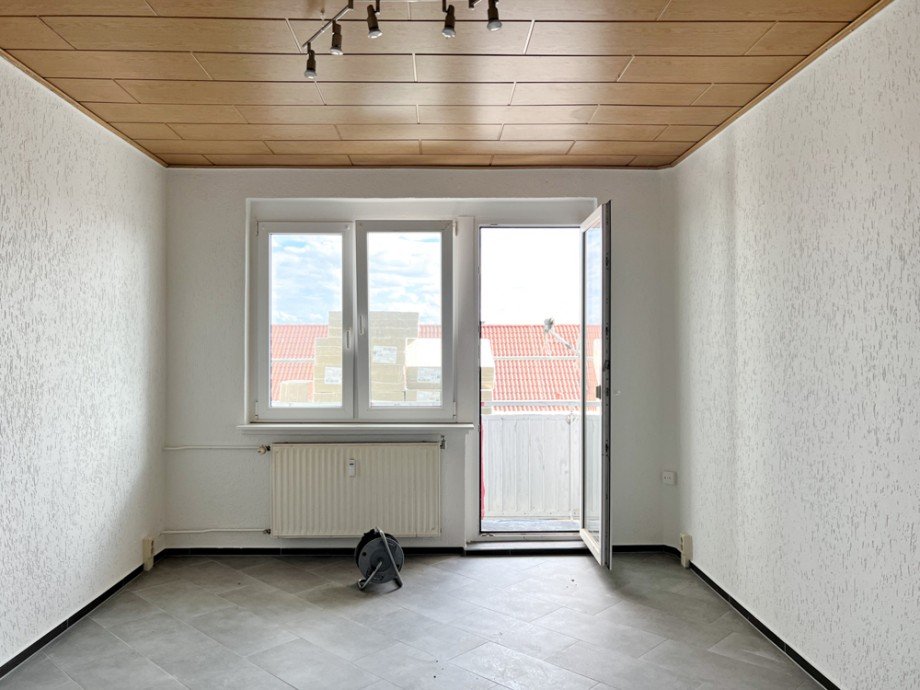 Wohnzimmer mit Balkon Etagenwohnung Buttst�dt