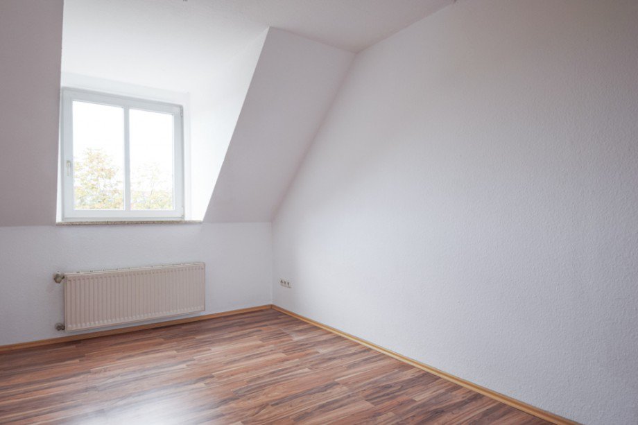 Wohnzimmer mit Gaubenfenster Dachgeschosswohnung Erfurt
