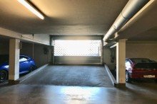 Ausfahrt Tiefgarage Erdgeschosswohnung mit Balkon und TG- Stellplatz