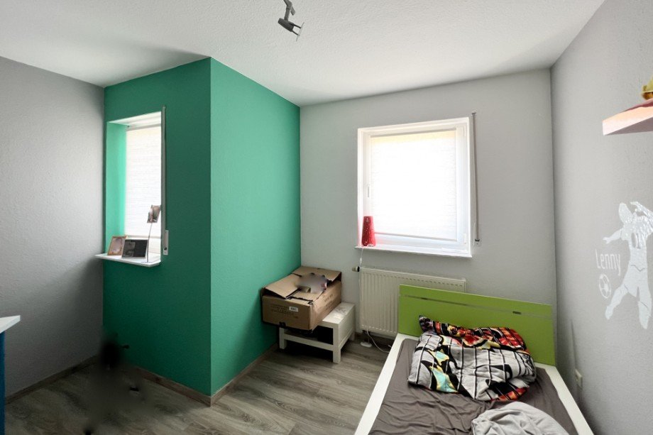 Kleines Schlafzimmer zur Stra�enseite Reihenmittelhaus Erfurt/ Frienstedt